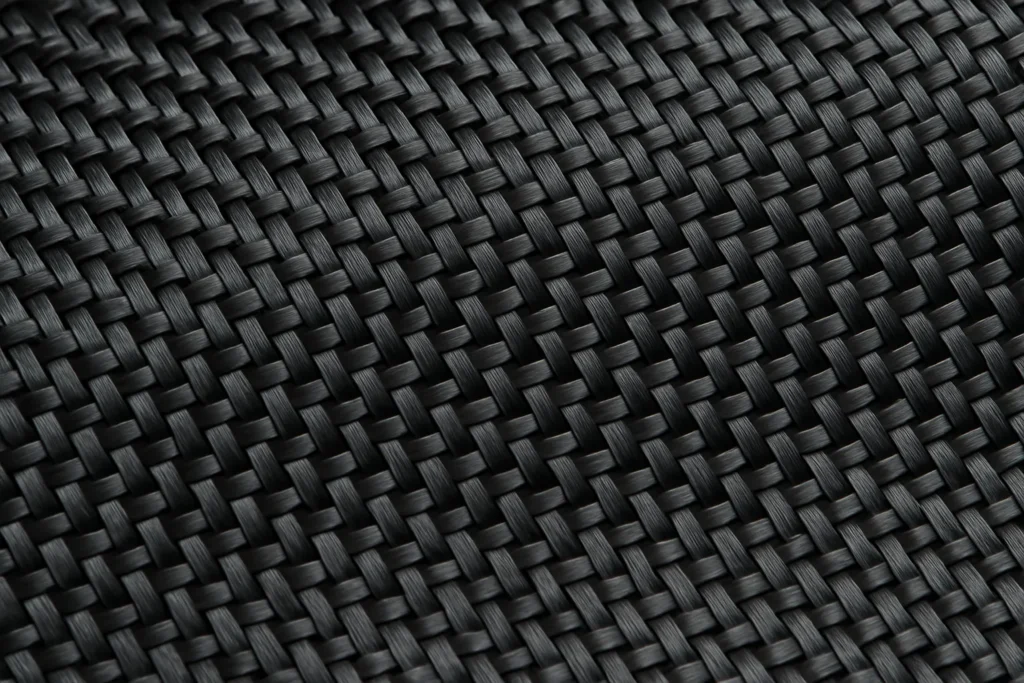 Close-up of carbon fiber weave used in high-performance paddle face materials for pickleball paddles